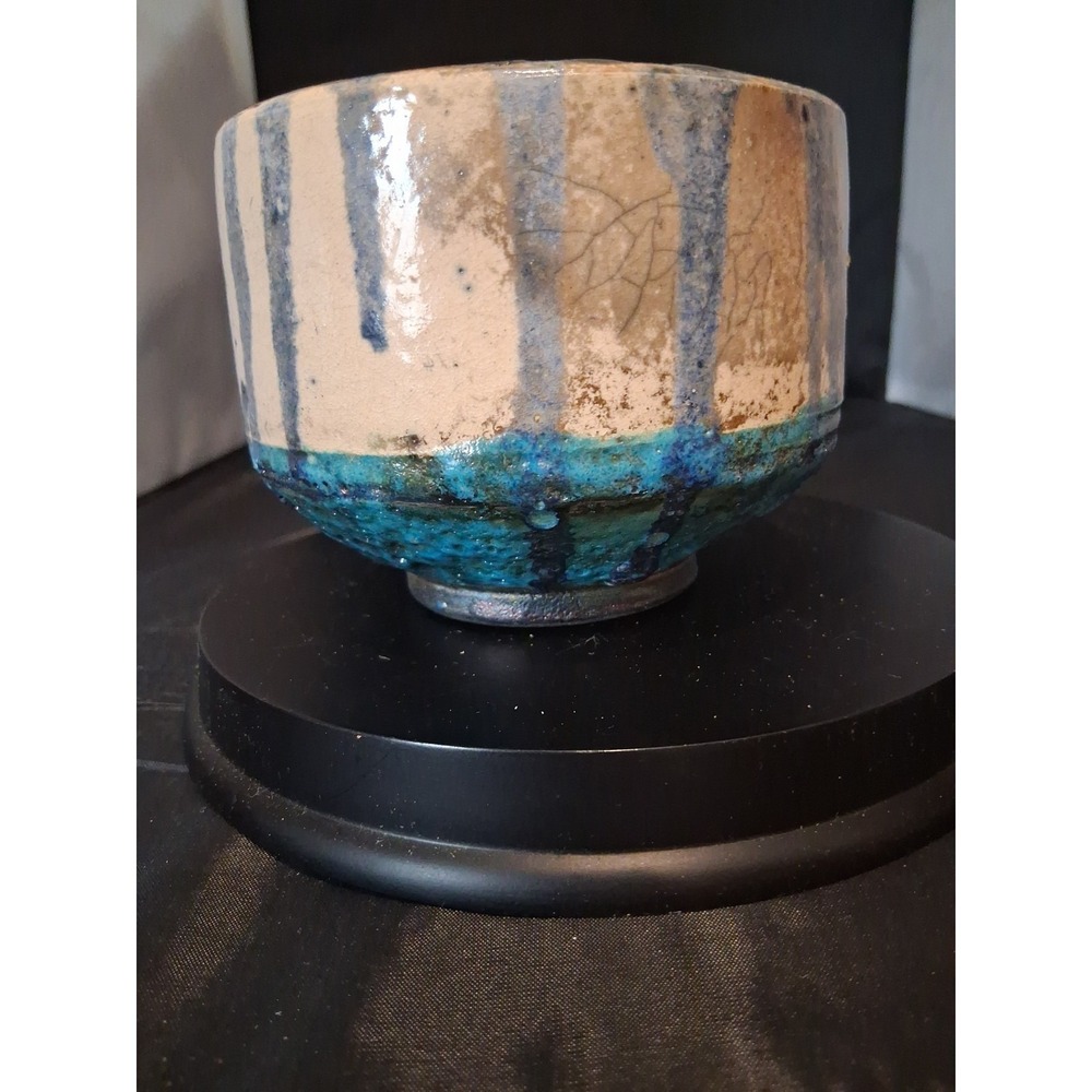 Raku pottery Vessel/Japanese tea bowl with blue‎ stripe and iridescent glaze